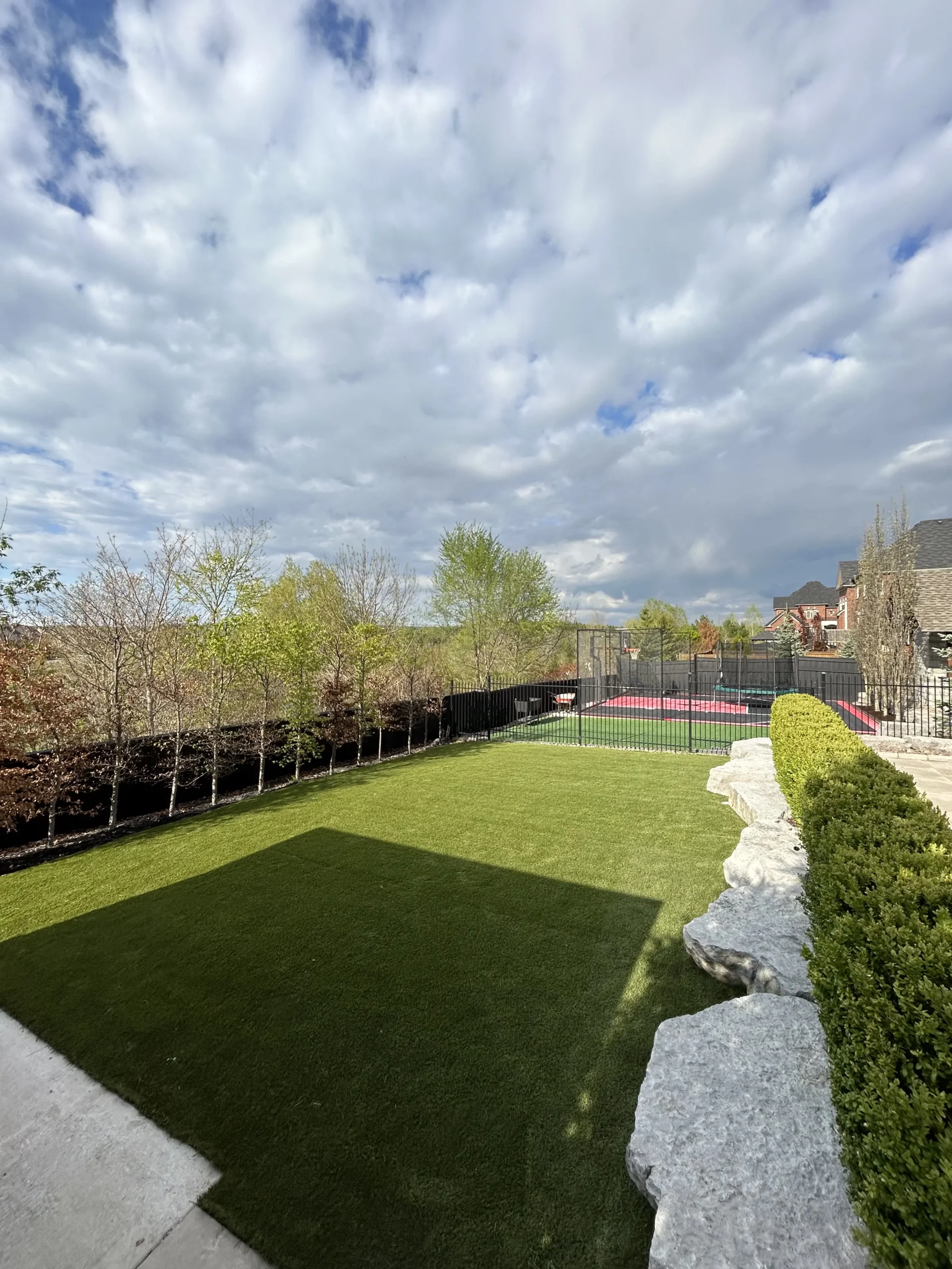 Backyard artificial grass installation in Newmarket