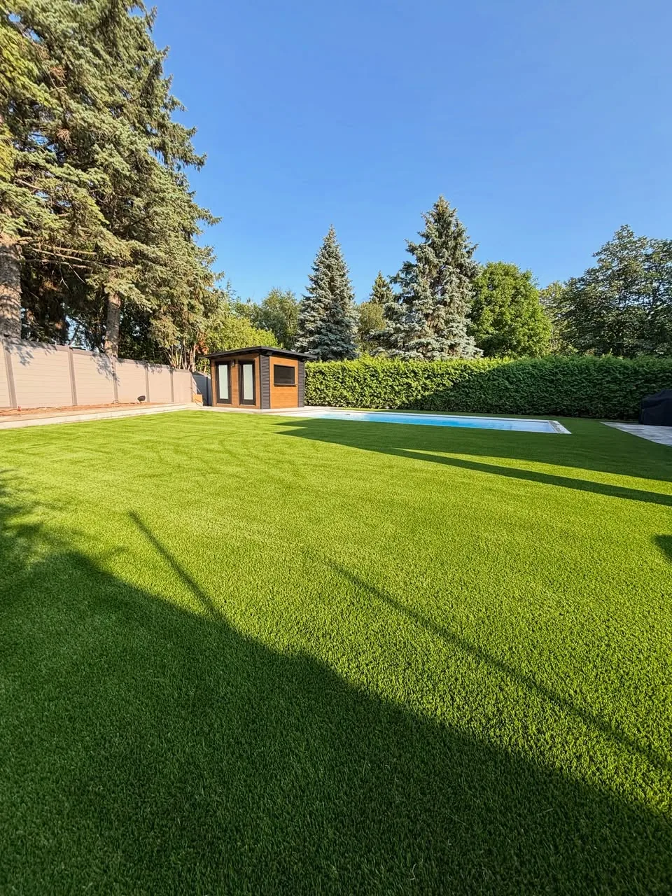Wide artificial grass lawn installation in Newmarket